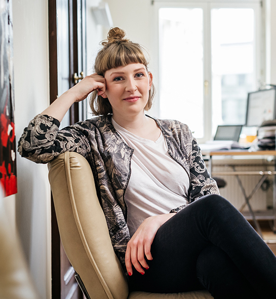 Woman smiling in an office