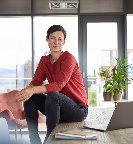 Woman smiling in an office